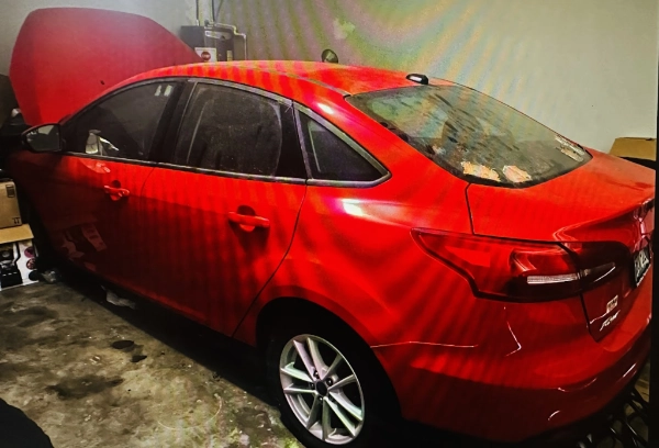 non-running car in Houston garage ready for junk car removal service